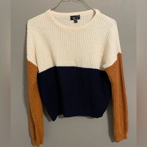 Women’s ‘Say what’ multi colored Sweater. Size Large.
